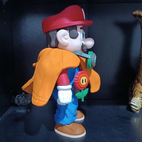 D_619402-MLB112535406293_052026-O.jpg Boneco Mario Explorador Poncho Removivel 3d 25cm - Imagem 5