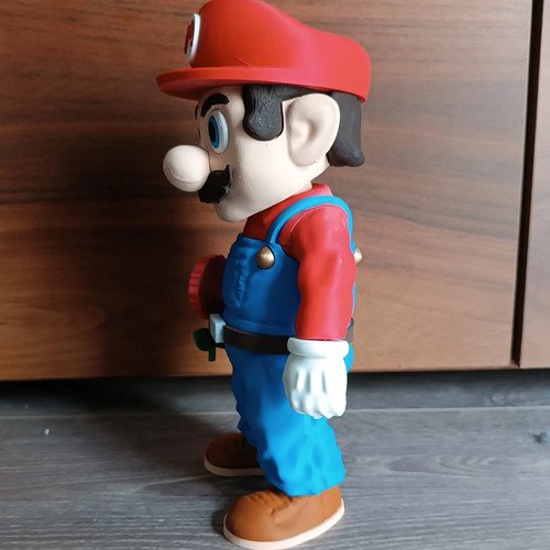 D_628559-MLB112535406255_052026-O.jpg Boneco Mario Explorador Poncho Removivel 3d 25cm - Imagem 4