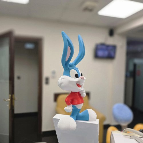 D_648755-MLB112280666339_052026-O.jpg Boneco Buster Bunny 20cm Action Figure Geek - Imagem 5