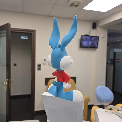 D_668361-MLB111254705962_052026-O.jpg Boneco Buster Bunny 20cm Action Figure Geek - Imagem 3