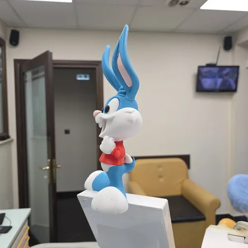 D_864966-MLB112280146703_052026-O.webp Boneco Buster Bunny 20cm Action Figure Geek - Imagem 4