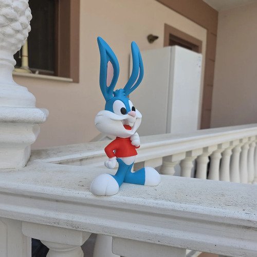 D_887805-MLB112280056369_052026-O.jpg Boneco Buster Bunny 20cm Action Figure Geek - Imagem 2